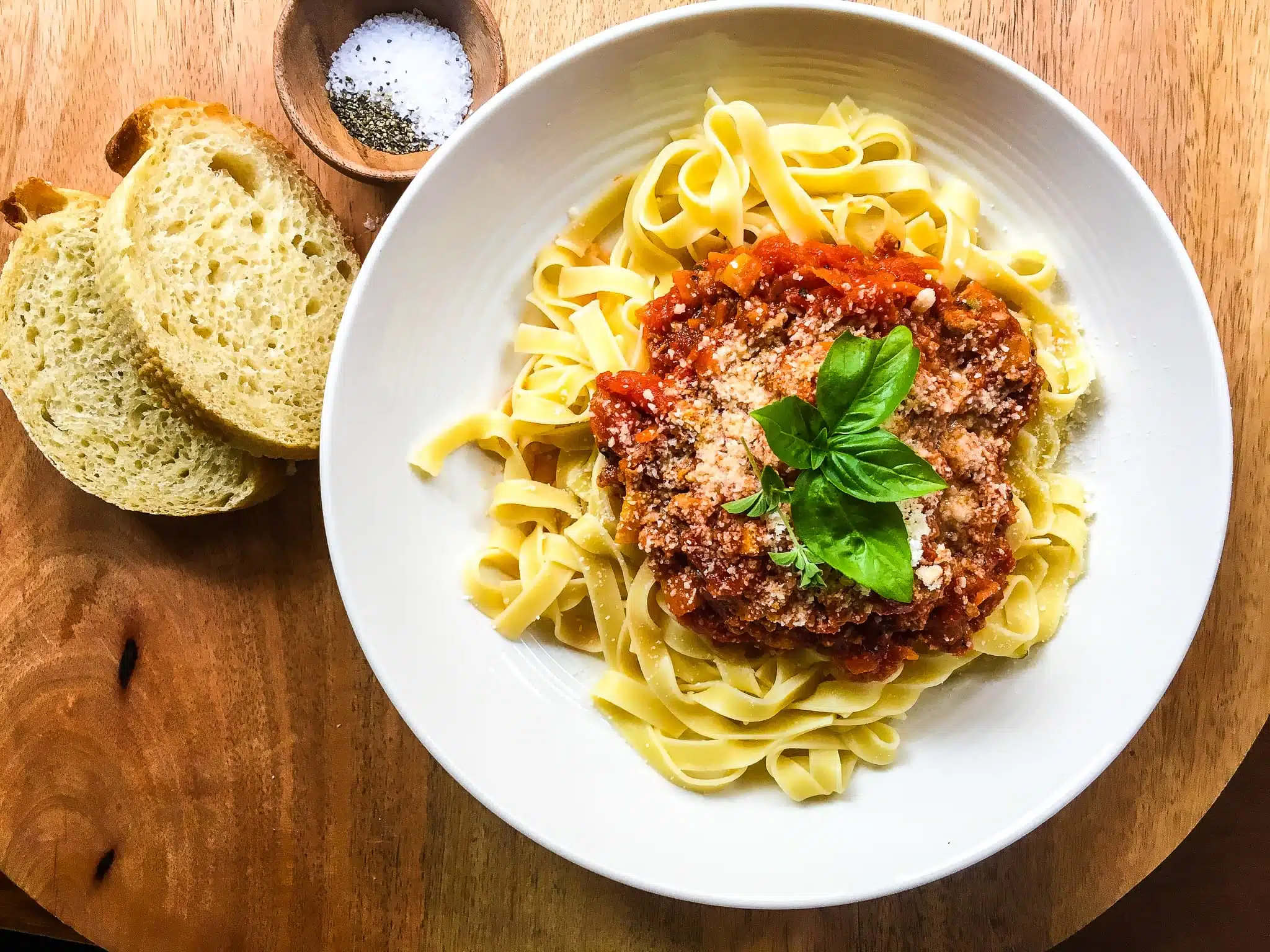 a plate of pasta with meat sauce