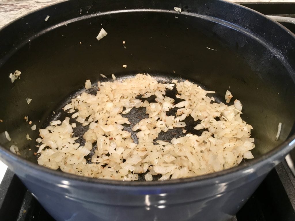 frying onions on a dutch oven