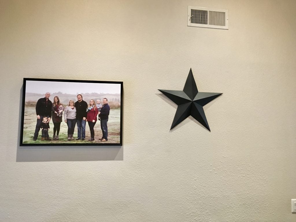 our framed family photo and a black star at the side.