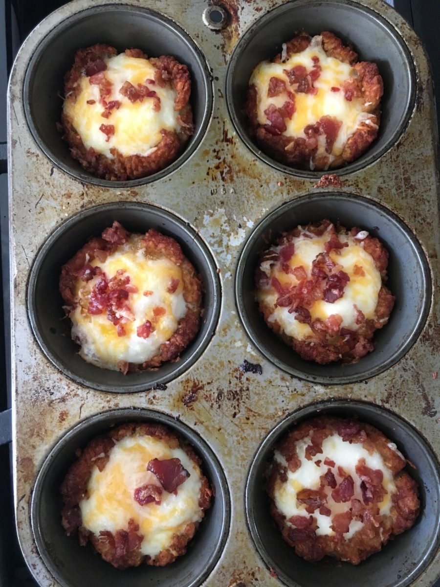 Tater tot egg cups baked in a muffin pan.