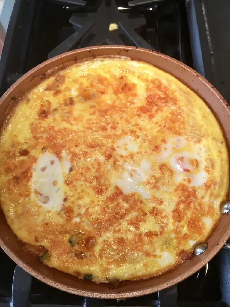 heating the frittata on a pan until the mixture is set