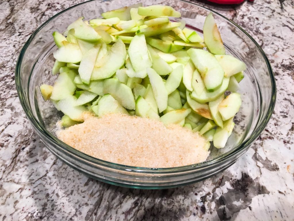 peeled apples with sugar