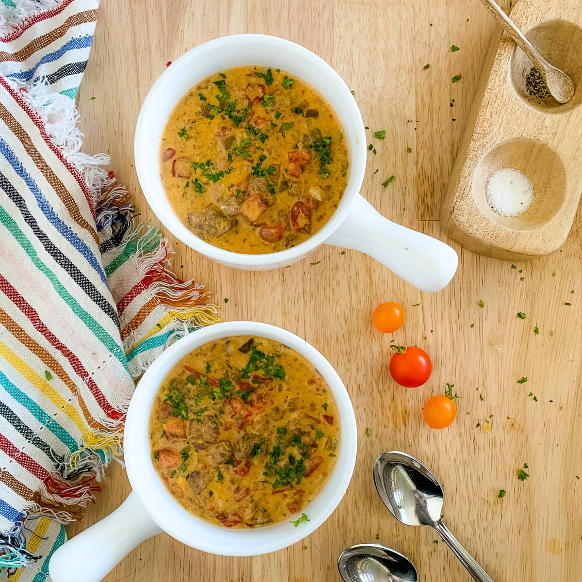 two bowls of cheeseburger chowder