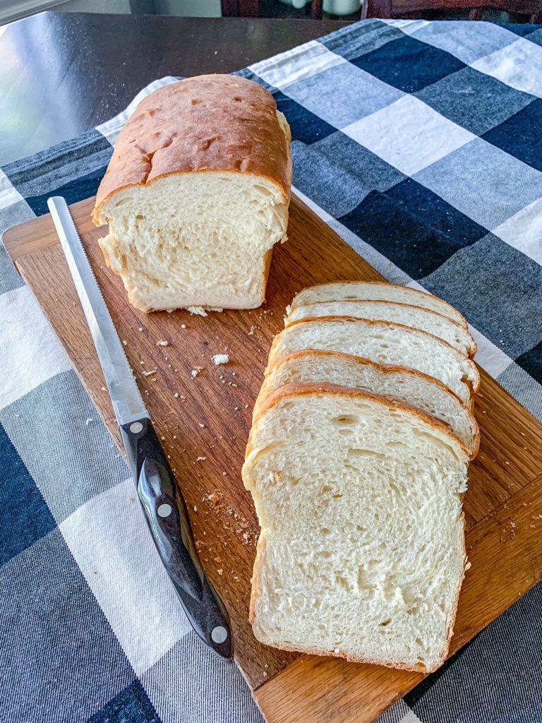 a loaf of cut homemade sandwich bread