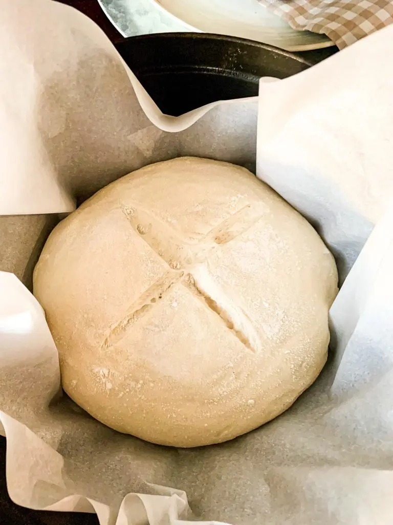 a loaf of easy sourdough bread ready to bake in the oven