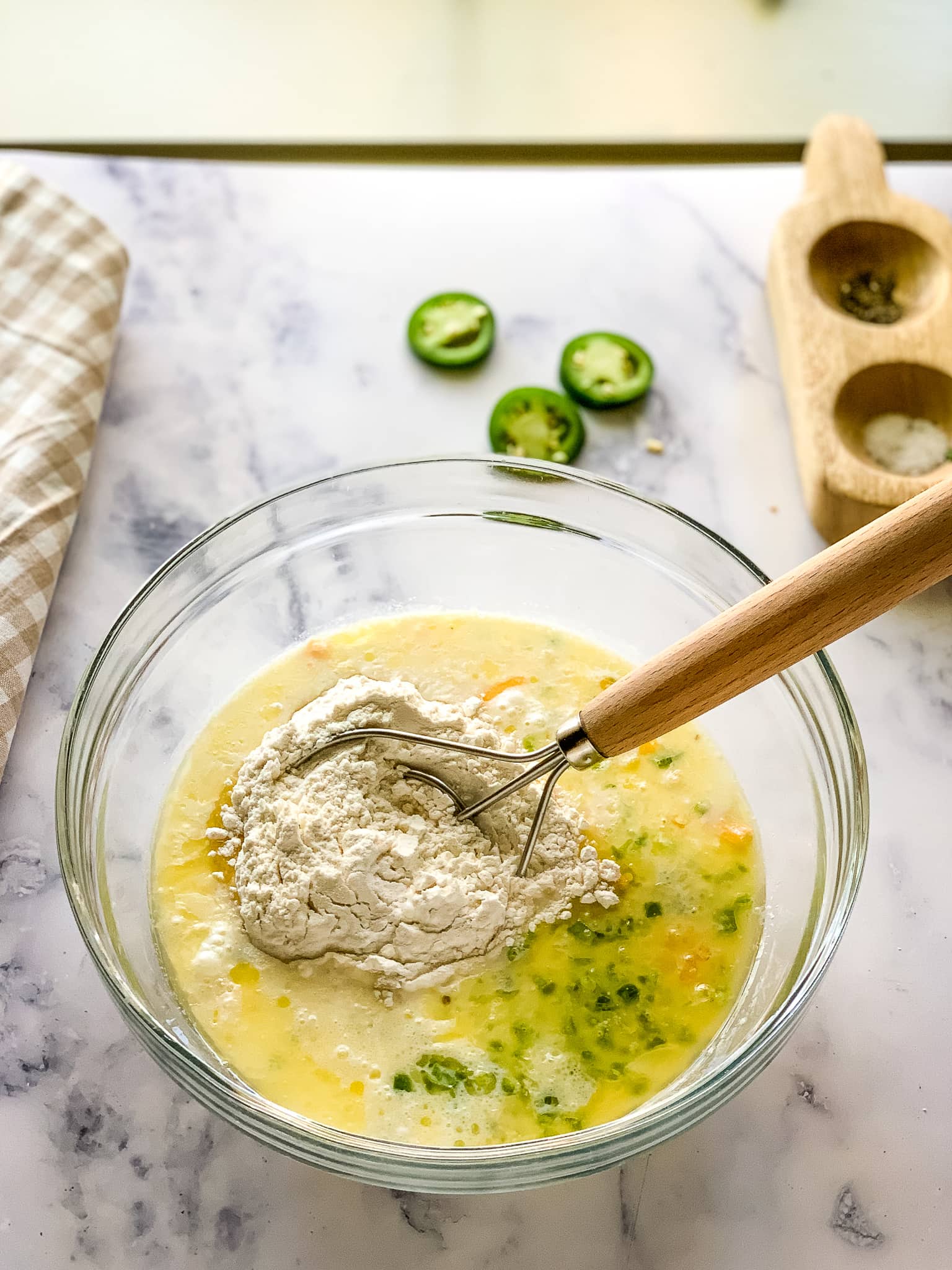 Mixing self rising flour into drop biscuit batter