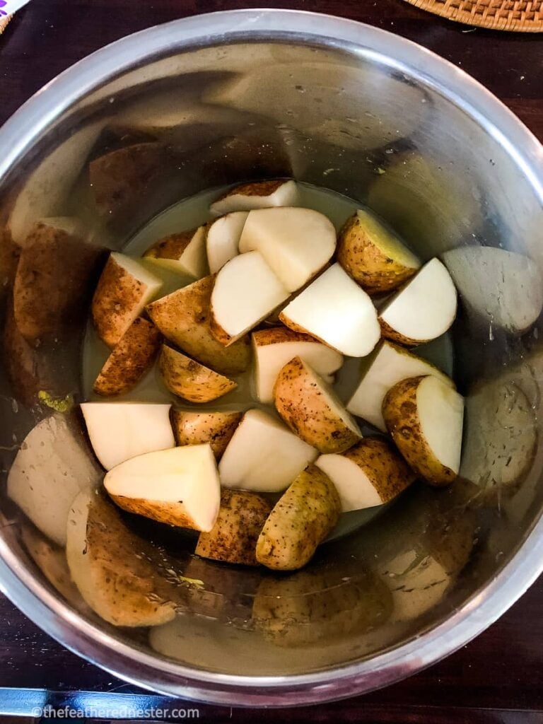 cut up potatoes ready to pressure cook.