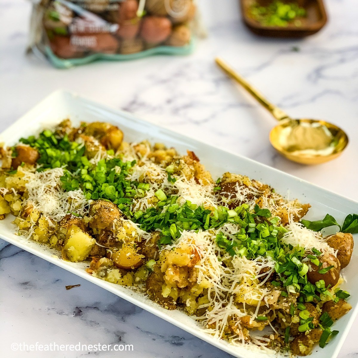 Instant Pot loaded red potatoes on a platter ready to serve.