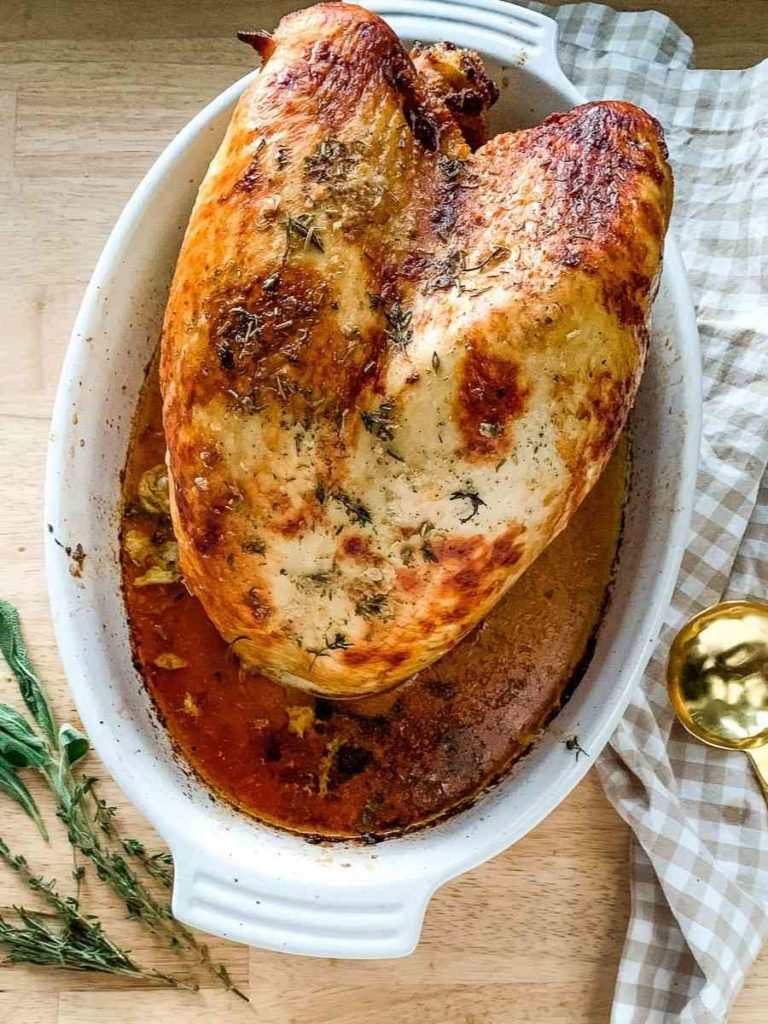 a casserole dish with buttermilk brined turkey for Thanksgiving dinner.