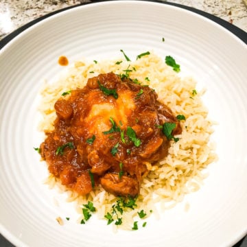 a white plate with Instant Pot Huli Huli Chicken.