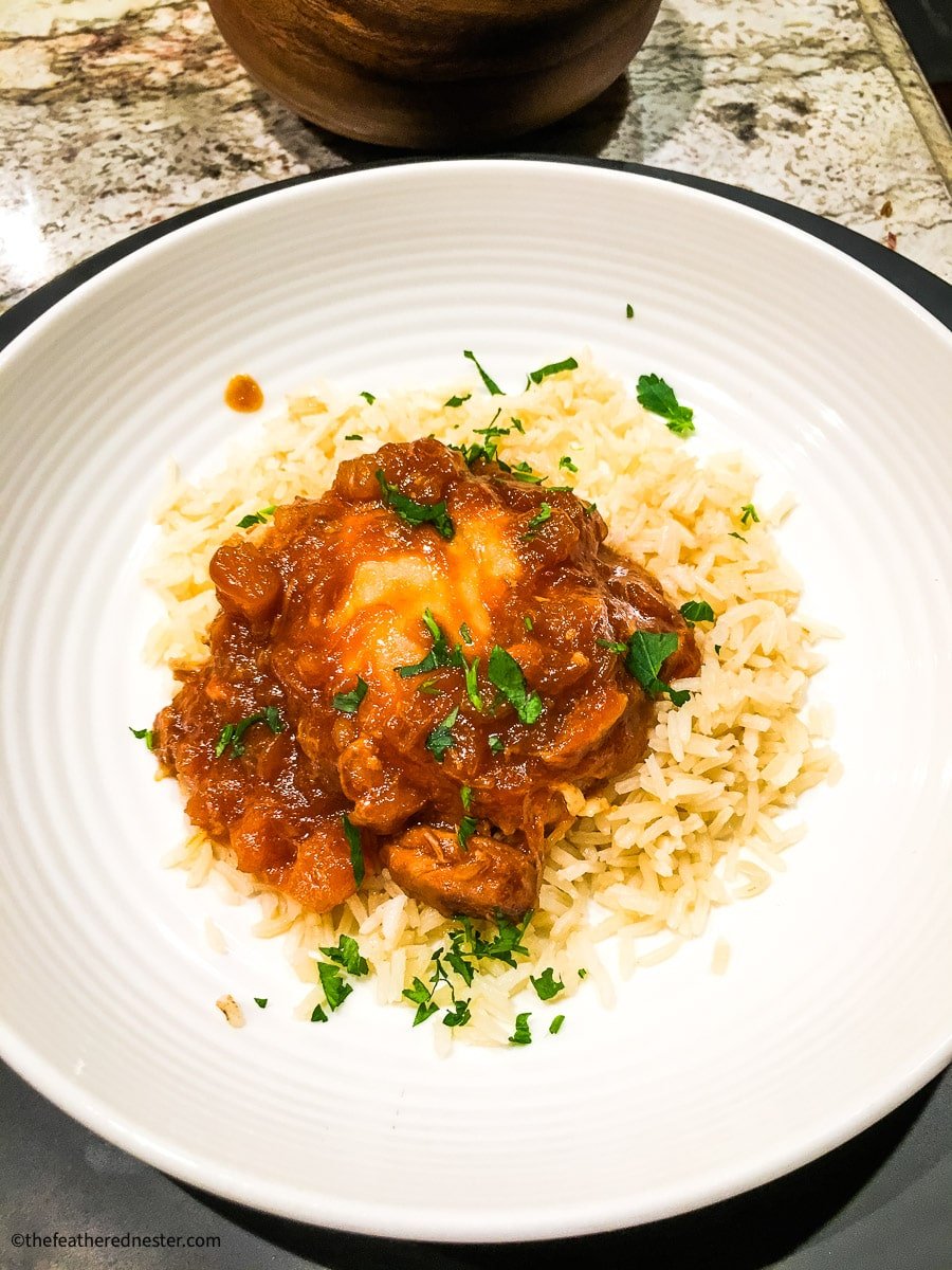 a white plate with Instant Pot Huli Huli Chicken.