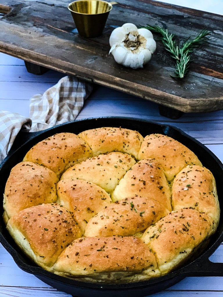 a skillet of rosemary dinner rolls from frozen dough.