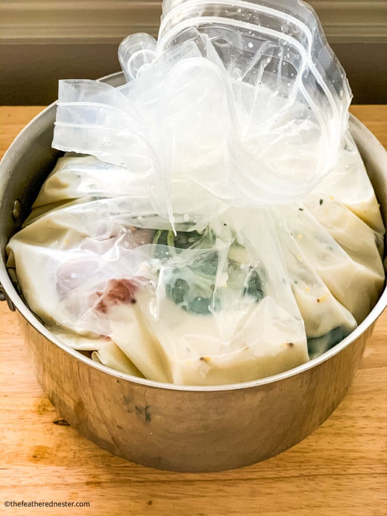 buttermilk brined turkey breast in a brine bag and stock pot