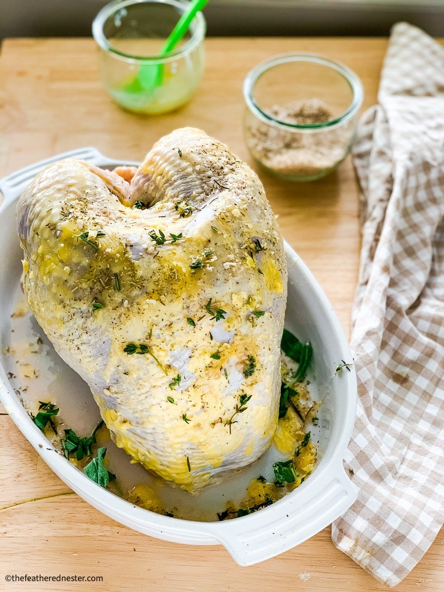 Turkey breast brushed with butter and ready to go into the oven.