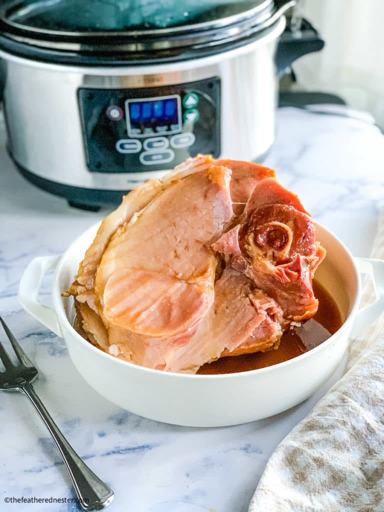 Ham with Coke glaze cooked in the slow cooker.