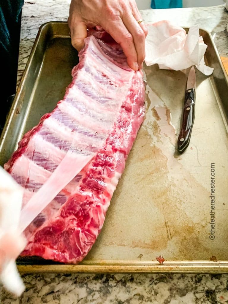 removing the rib membranes before slow cooking the teriyaki ribs