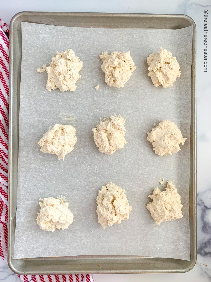 Putting the dough on a baking sheet.