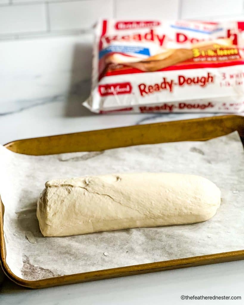 a loaf of thawing frozen dough
