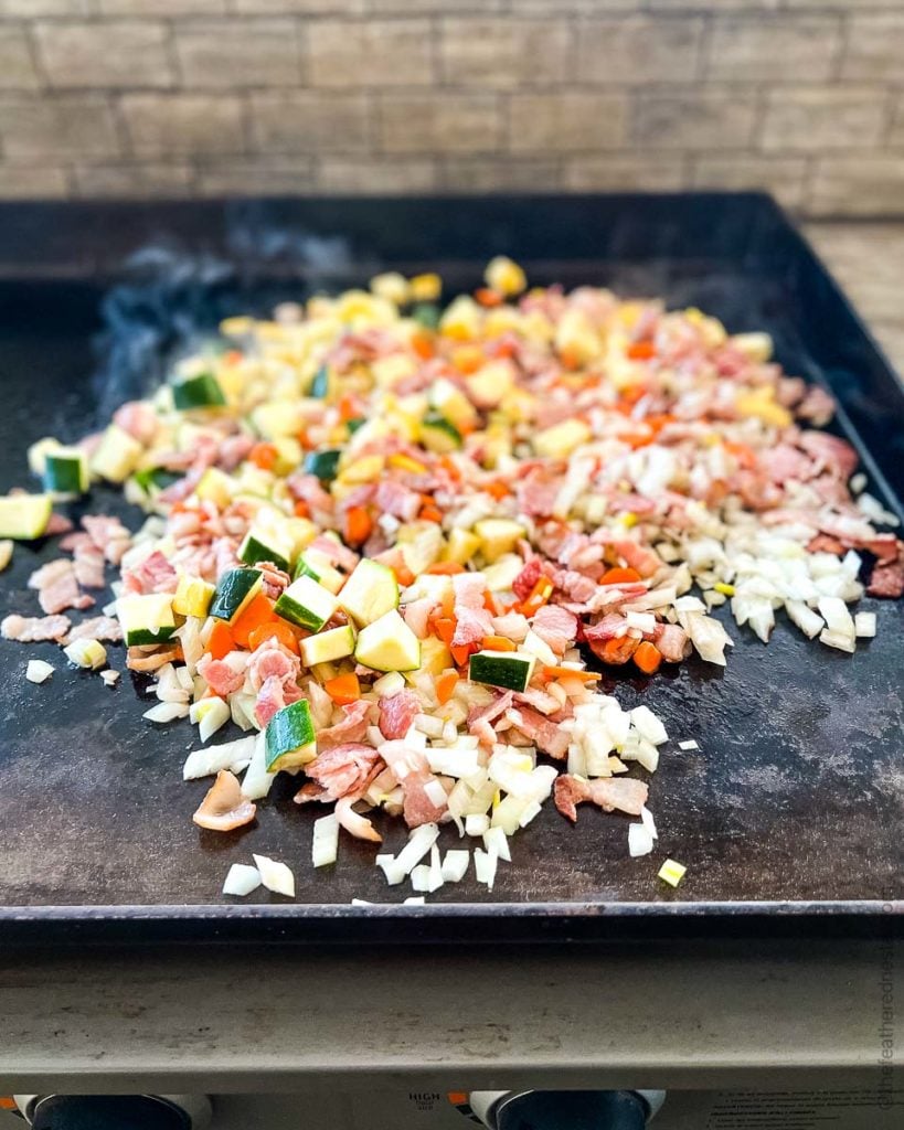 diced vegetables cooking on the Blackstone Griddle