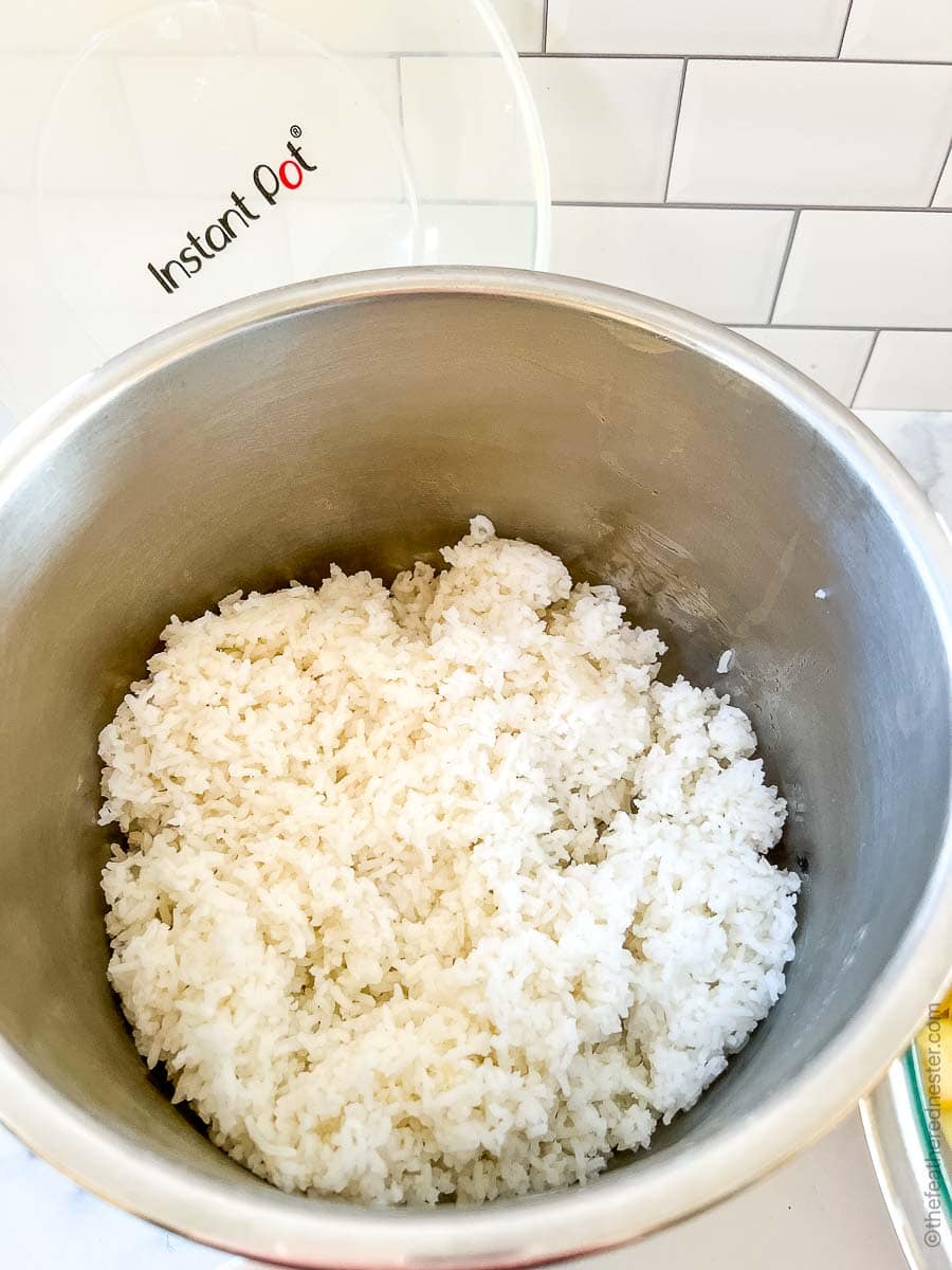 The Instant Pot with cooked rice.
