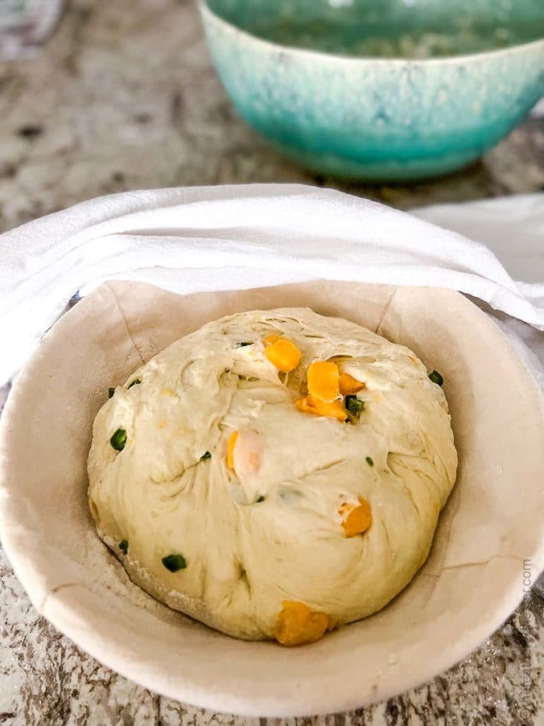 sourdough bread dough in a banneton bowl