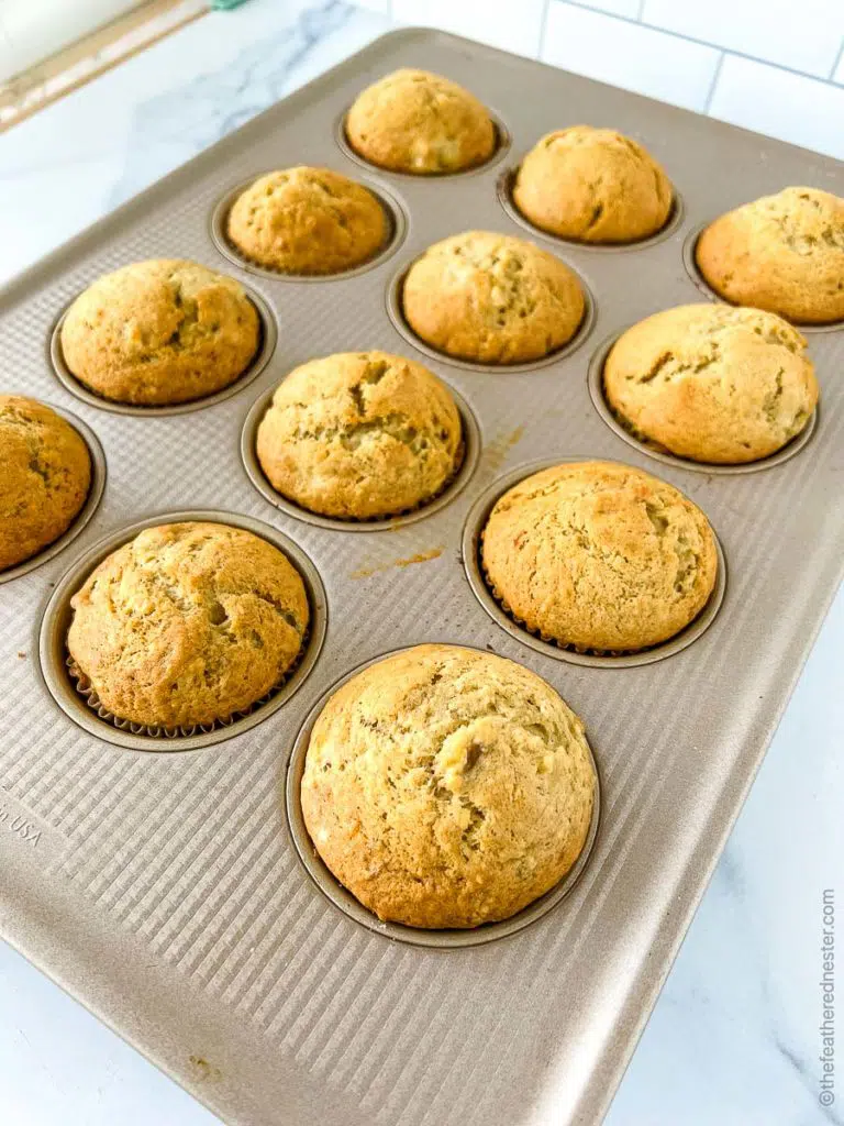 a dozen freshly baked Bisquick banana muffins ready to serve