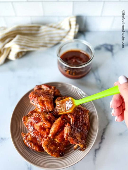 basting chicken with homemade 3 ingredient bbq sauce