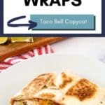a Taco Bell copycat crunchwrap supreme cut in half on a plate