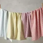 striped kitchen towels hanging up