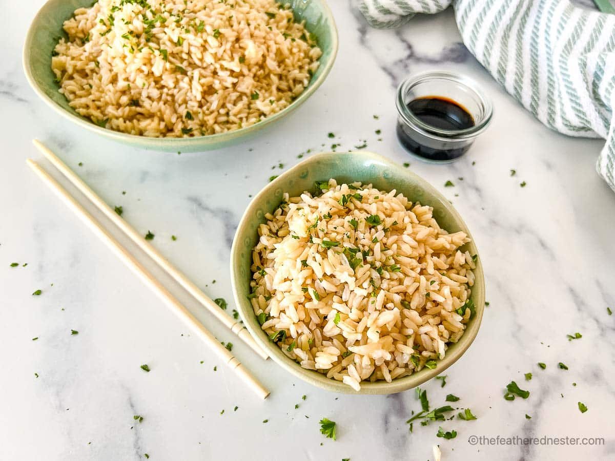 Two bowls of Instant Pot brown basmati rice, ready to be served. 