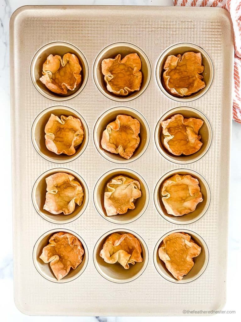 oven baked wonton cups in a muffin pan.