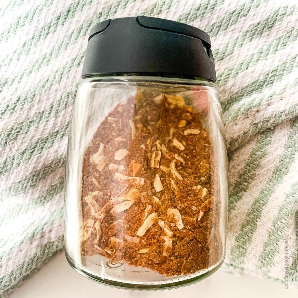 chicken taco spice mix inside a spice container.
