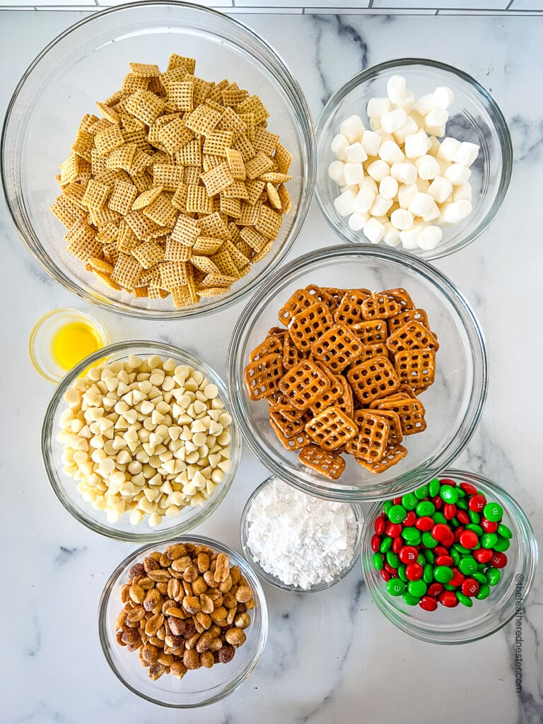 bowls of sweet and salty ingredients to make holiday snack mx.