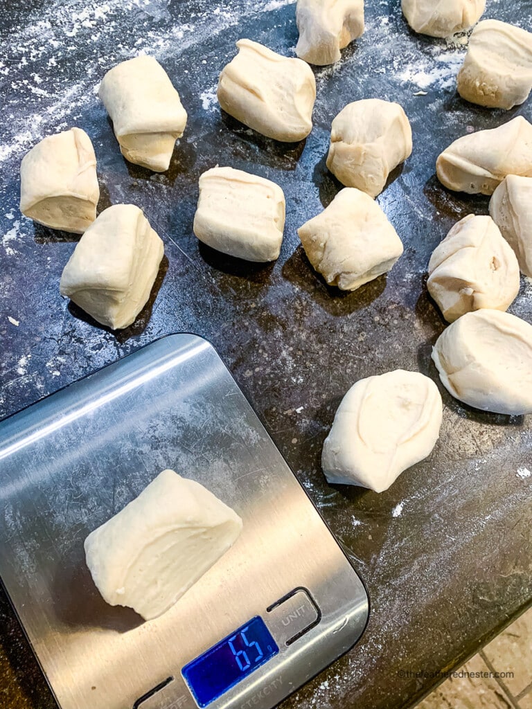 cutting the dough into 16 equal pieces.