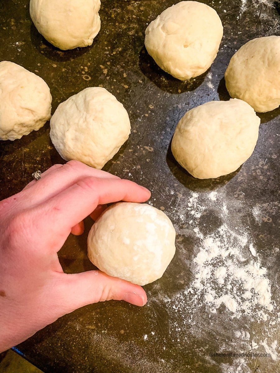 Rolling the dough into balls using by hand.