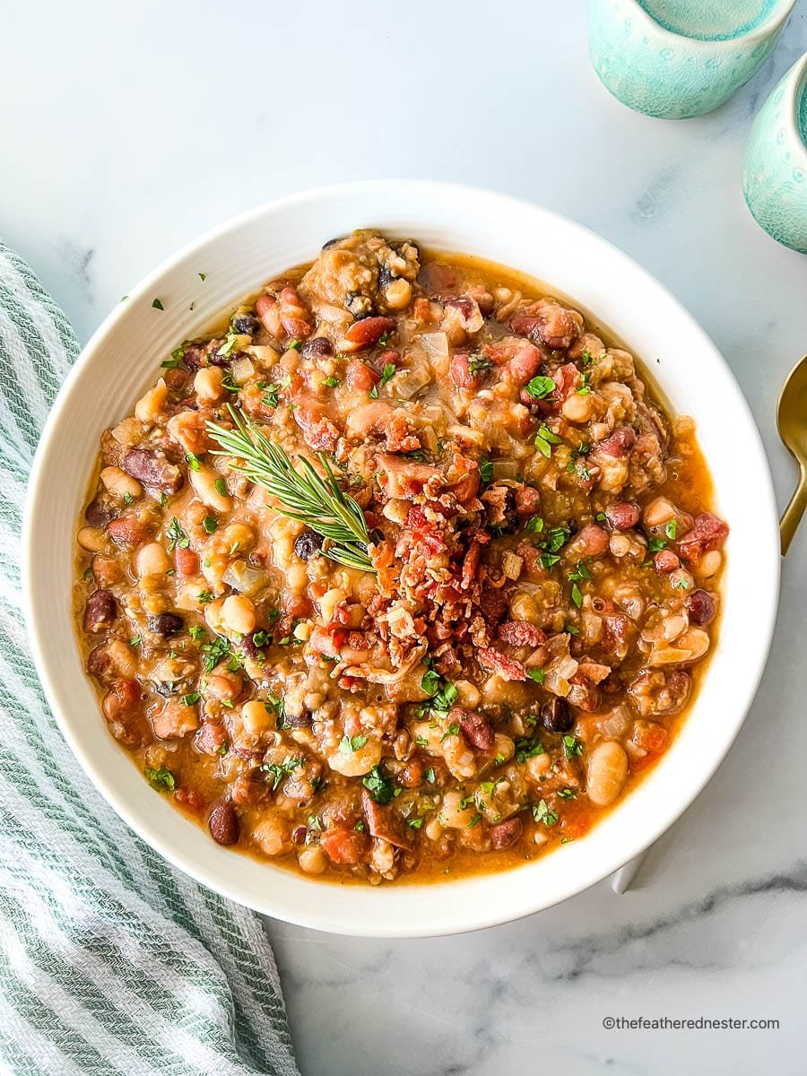 15 bean soup with ham in a white bowl.