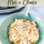 Mac and Cheese with a spoon on a green bowl and a Crock Pot at the back. with writings on top and bottom