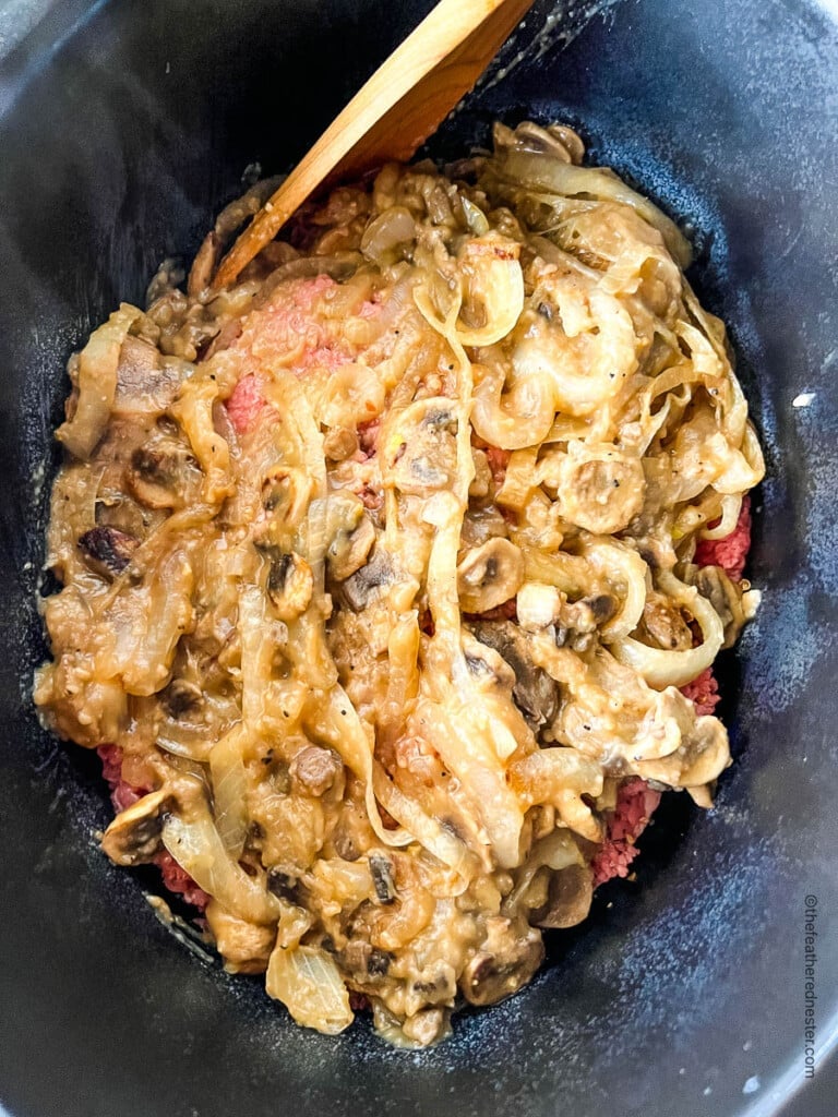 mushroom and onion gravy over cube steak in Crock Pot.