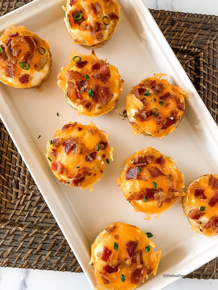 white tray with hash brown breakfast cups.