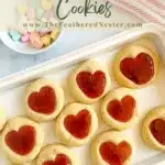 Heart jam cookies on a serving tray.