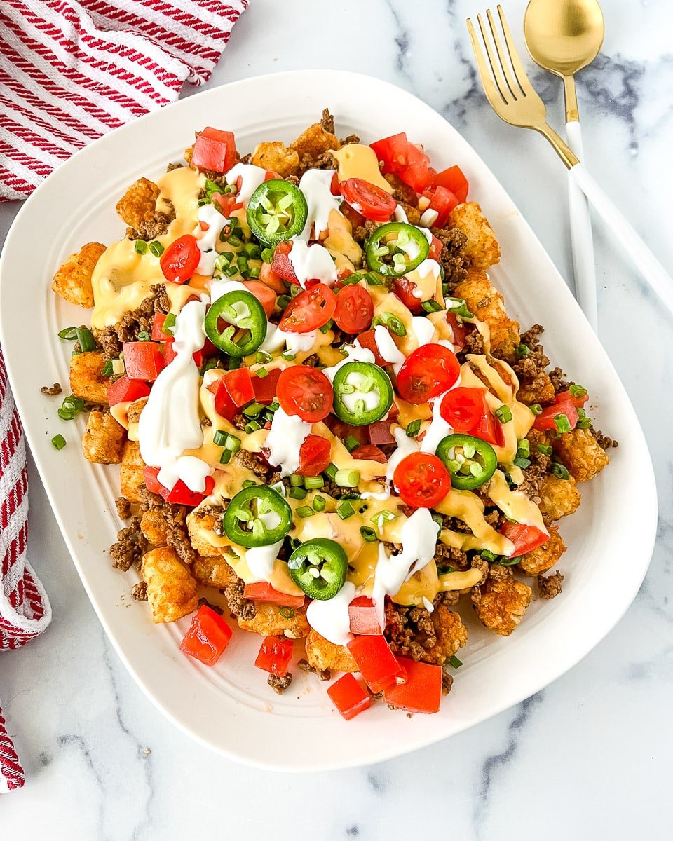 Looking down onto a platter of game day nachos.