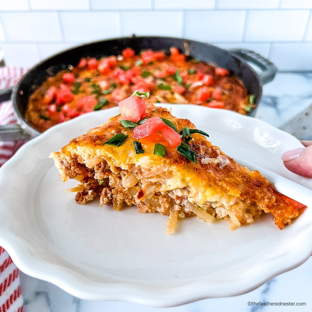 A plated slice of Bisquick breakfast casserole ready to serve