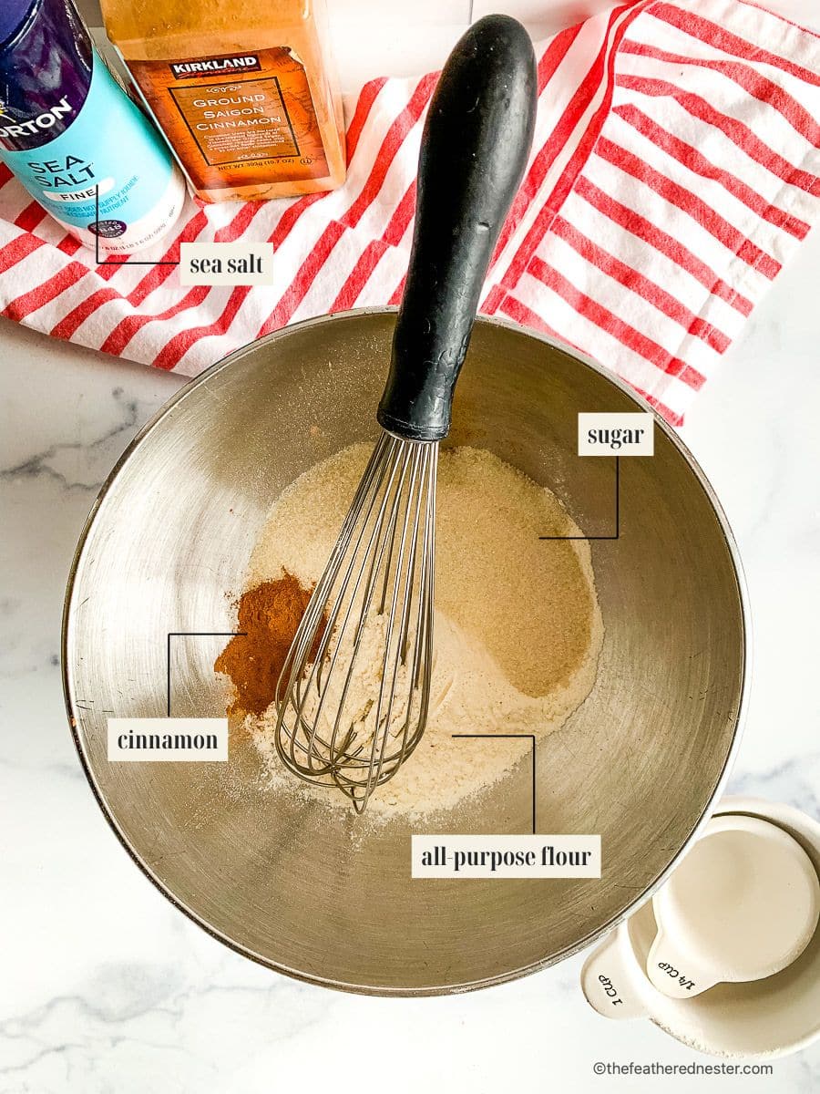 Whisk in a mixing bowl with flour, cinnamon, salt, and sugar.