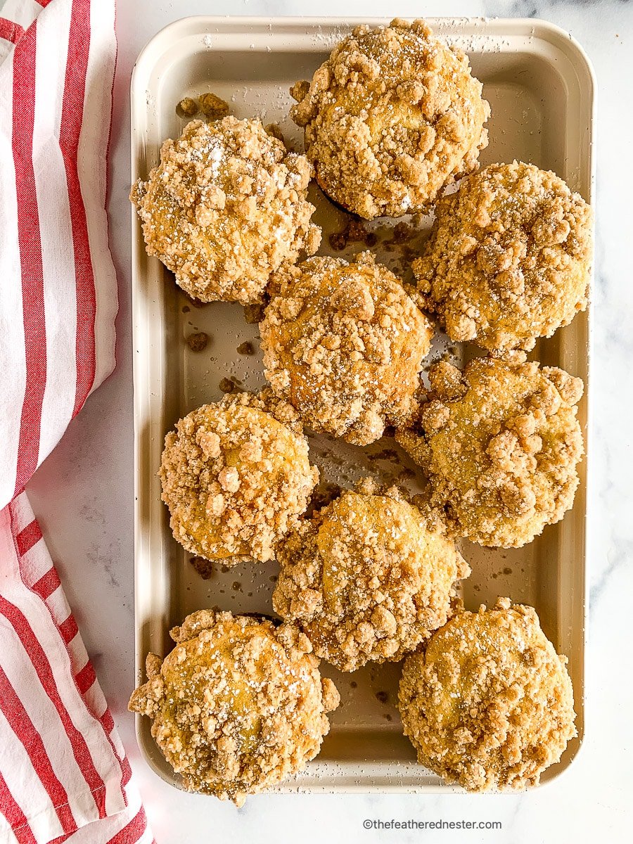 Tray of bakery style coffee cake muffins.