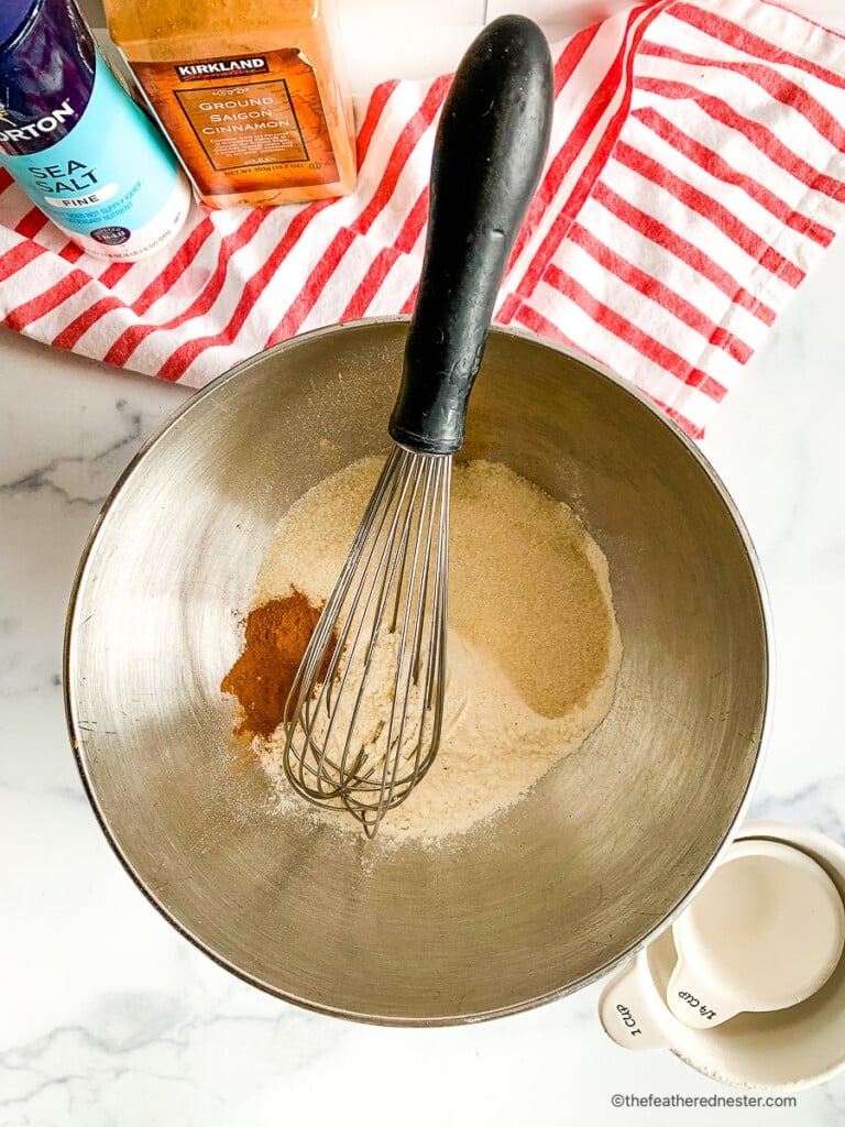 Whisk in a mixing bowl with flour, cinnamon, salt, and sugar.