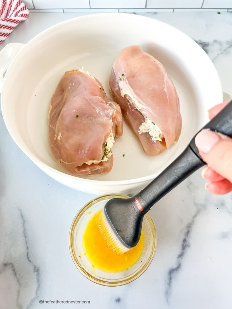 Preparing homemade version of Ruth Chris chicken recipe for baking in the oven.