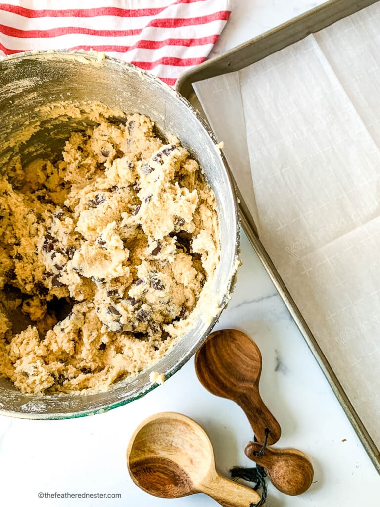 Mixing bowl of chocolate chip cookie dough.