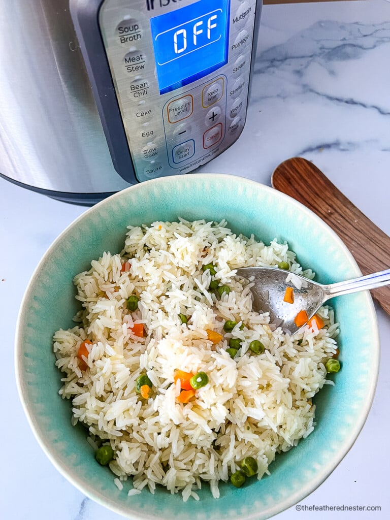 Dish of Instant Pot rice pilaf with veggies.