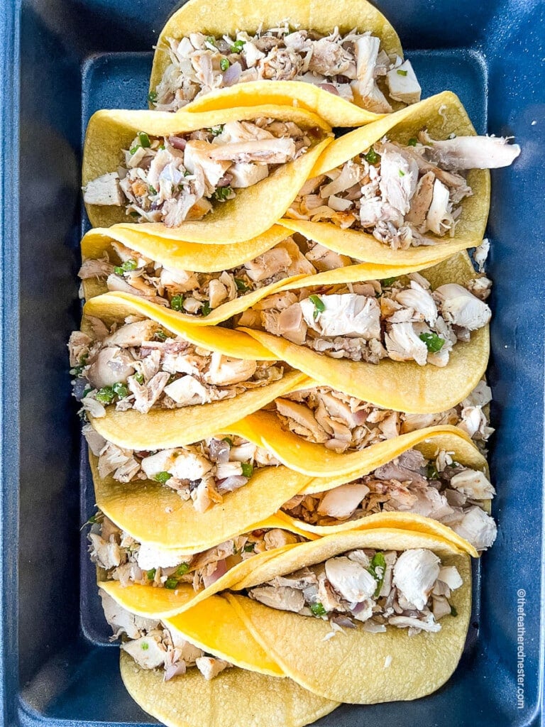 rotisserie chicken tacos on a platter.