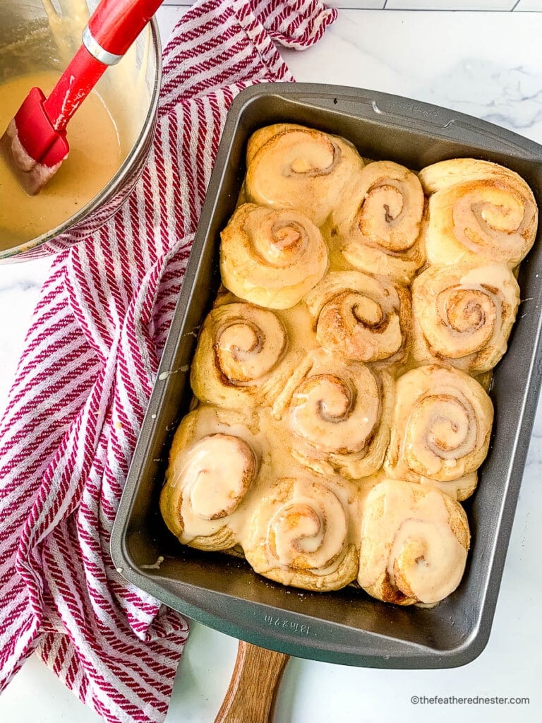 Pan of baked and glazed sourdough discard cinnamon rolls.